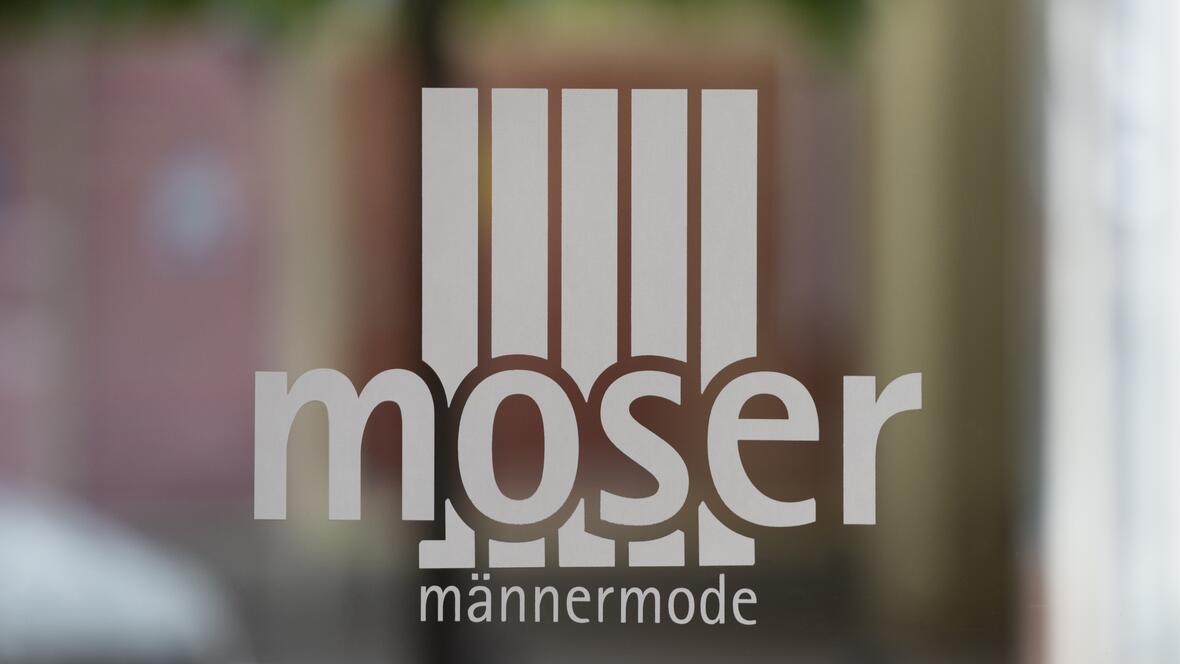 Moser Männermode - Logo Glas